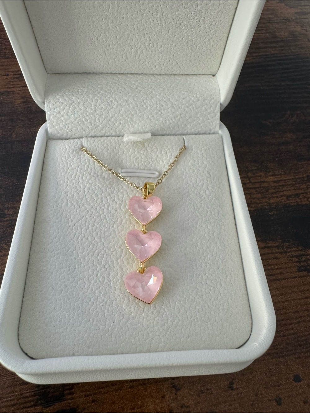 Gold Necklace with Three Pink Heart Pendants